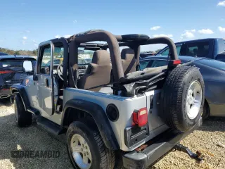 2004 Jeep Wrangler Sport with VIN 1J4FA49SX4P776775, listed as a Copart auction lot 74946824 with Not Provided miles and Salvage Title. Bid and sale history available at carsss.com. Image 2.