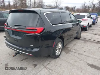 2022 Chrysler Pacifica Touring L z VIN 2C4RC3BG6NR164599, wystawiony jako IAAI lot #41727606 z przebiegiem 17 078 mil mil oraz . Historia ofert i sprzedaży dostępna na DreamBid. Obrazek 4.