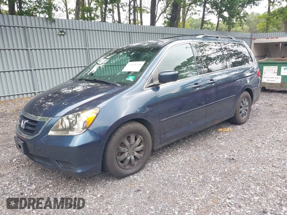 2010 Honda Odyssey EX with VIN 5FNRL3H46AB080950, listed as a IAAI auction lot 42658218 with 185,742 mi miles and . Bid and sale history available at DreamBid. Image 2.
