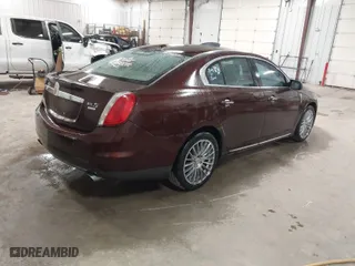2009 Lincoln MKS with VIN 1LNHM94R39G601388, listed as a IAAI auction lot 41606169 with 192,662 mi miles. Bid and sale history available at carsss.com. Image 4.
