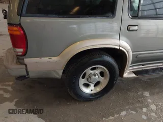 2000 Ford Explorer Eddie Bauer with VIN 1FMZU74E8YZB41346, listed as a IAAI auction lot 41601042 with 295,103 mi miles and . Bid and sale history available at DreamBid. Image 12.