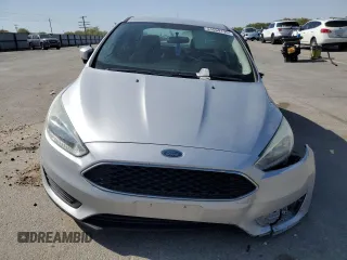 2015 Ford Focus SE with VIN 1FADP3F28FL241020, listed as a Copart auction lot 54559135 with 123,008 mi miles and Salvage title. Bid and sale history available at DreamBid. Image 5.