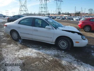 1997 Mercury Sable GS with VIN 1MELM50U6VA657452, listed as a IAAI auction lot 41415751 with 185,235 mi miles. Bid and sale history available at carsss.com. Image 1.