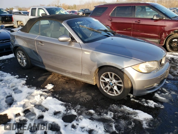2009 BMW 1 Series 128i with VIN WBAUN13569VH80991, listed as a Copart auction lot 43225685 with 104,652 mi miles and Salvage Title. Bid and sale history available at DreamBid. Image 4.