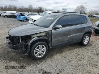 2016 Volkswagen Tiguan S with VIN WVGBV7AX4GW593475, listed as a Copart auction lot 52433155 with 140,356 mi miles and Salvage Title. Bid and sale history available at DreamBid. Image 1.
