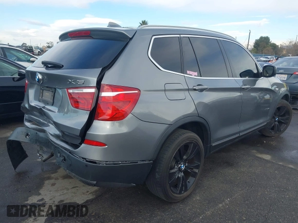 2013 BMW X3 xDrive35i with VIN 5UXWX7C5XDL977879, listed as a IAAI auction lot 41396936 with 107,727 mi miles and . Bid and sale history available at DreamBid. Image 4.