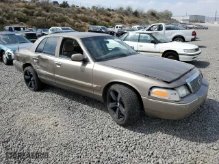 2005 Mercury Grand Marquis GS with VIN 2MEFM74W75X627162, listed as a Copart auction lot 64709124 with 118,697 mi miles and Salvage Title. Bid and sale history available at carsss.com. Image 4.