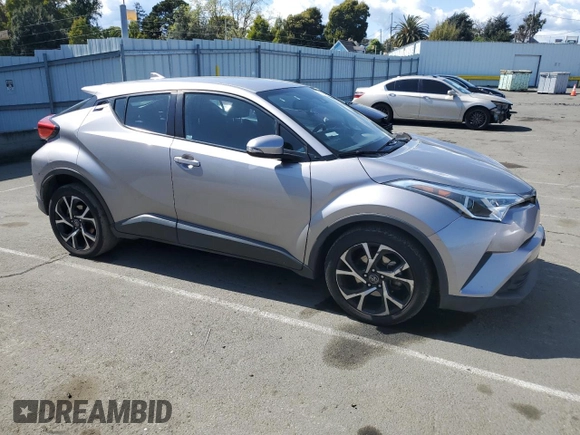 2018 Toyota C-HR XLE with VIN NMTKHMBX6JR047937, listed as a Copart auction lot 51705805 with 128,543 mi miles and Salvage Title. Bid and sale history available at DreamBid. Image 4.