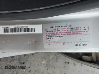 2003 Kia Sorento LX z VIN KNDJC733335030322, wystawiony jako Copart lot #77607974 z przebiegiem 109 777 mil mil oraz Szkoda całkowita • Salvage title. Historia ofert i sprzedaży dostępna na DreamBid. Obrazek 13.