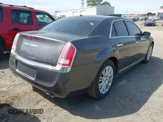 2013 Chrysler 300 C with VIN 2C3CCAKT2DH567348, listed as a IAAI auction lot 41909284 with 110,710 mi miles and . Bid and sale history available at DreamBid. Image 4.