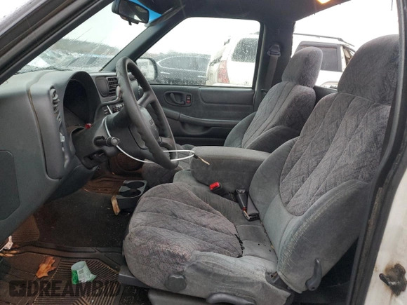 2001 GMC Sonoma SL with VIN 1GTCS145418119062, listed as a Copart auction lot 80579954 with 76,295 mi miles and Salvage Title. Bid and sale history available at carsss.com. Image 7.