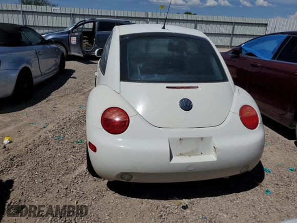 2001 Volkswagen Beetle GLX z VIN 3VWDD21C71M435250, wystawiony jako Copart lot #65546334 z przebiegiem 189 542 mil mil oraz Szkoda całkowita • Salvage title. Historia ofert i sprzedaży dostępna na DreamBid. Obrazek 6.