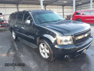2010 Chevrolet Suburban LTZ with VIN 1GNUKKE37AR188966, listed as a IAAI auction lot 41833988 with 215,922 mi miles. Bid and sale history available at carsss.com. Image 1.