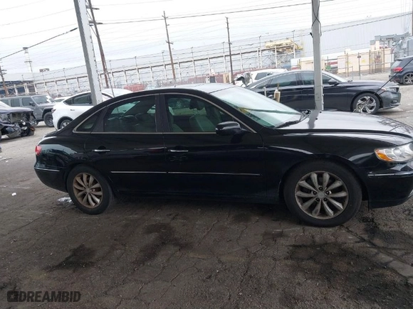 2006 Hyundai Azera SE with VIN KMHFC46F36A087296, listed as a IAAI auction lot 41870253 with 186,576 mi miles. Bid and sale history available at carsss.com. Image 13.