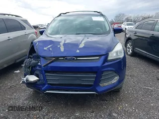 2016 Ford Escape SE z VIN 1FMCU9G99GUC32802, wystawiony jako IAAI lot #41958414 z przebiegiem 131 962 mil mil oraz . Historia ofert i sprzedaży dostępna na DreamBid. Obrazek 12.