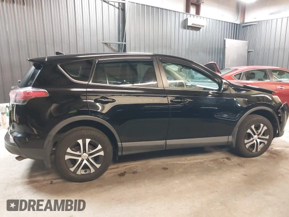 2018 Toyota RAV4 LE with VIN 2T3BFREV7JW768376, listed as a IAAI auction lot 41864571 with 292,147 mi miles. Bid and sale history available at carsss.com. Image 14.