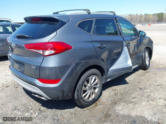 2017 Hyundai Tucson Value with VIN KM8J33A23HU405296, listed as a IAAI auction lot 41887237 with 114,027 mi miles. Bid and sale history available at carsss.com. Image 4.
