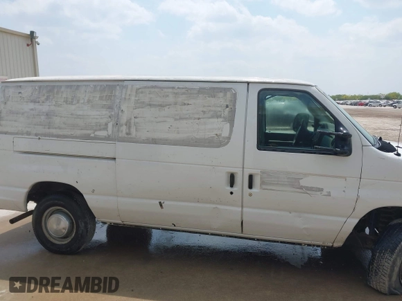 2012 Ford Econoline Cargo Recreational with VIN 1FTNE2EW2CDA43588, listed as a IAAI auction lot 41939220 with 246,855 mi miles. Bid and sale history available at carsss.com. Image 13.
