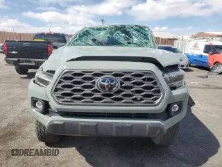 2023 Toyota Tacoma SR with VIN 3TMCZ5AN3PM563612, listed as a Copart auction lot 53995225 with 37,699 mi miles and Salvage title. Bid and sale history available at DreamBid. Image 5.