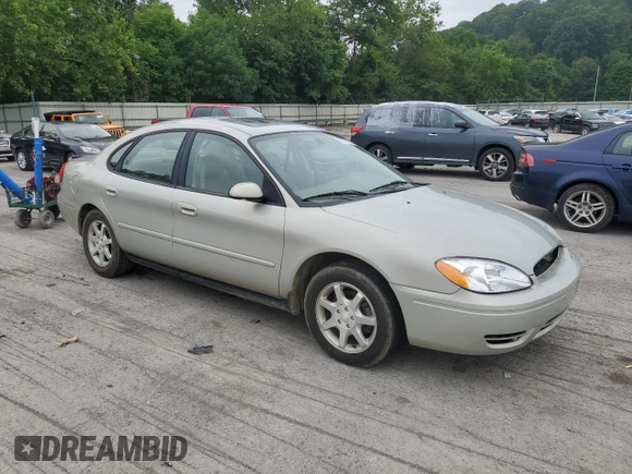 2006 Ford Taurus SEL with VIN 1FAFP56U86A194072, listed as a Copart auction lot 63779615 with 77,377 mi miles and Salvage title. Bid and sale history available at DreamBid. Image 4.