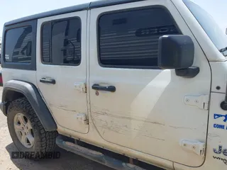 2018 Jeep Wrangler Unlimited Sport S with VIN 1C4HJXDG8JW127299, listed as a IAAI auction lot 42091561 with 116,082 mi miles and . Bid and sale history available at DreamBid. Image 13.