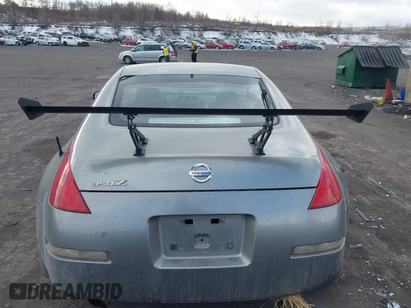 2005 Nissan 350Z Touring with VIN JN1AZ34E85M652465, listed as a IAAI auction lot 41418161 with 153,099 mi miles. Bid and sale history available at carsss.com. Image 16.