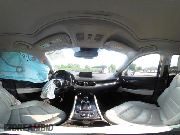 2018 Mazda CX-5 Grand Touring with VIN JM3KFBDM2J0448555, listed as a IAAI auction lot 42449282 with 65,770 mi miles and . Bid and sale history available at DreamBid. Image 19.