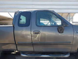 2003 Ford F-150 XL with VIN 1FTRX17L03NA40448, listed as a IAAI auction lot 41473201 with 1 mi miles. Bid and sale history available at carsss.com. Image 14.