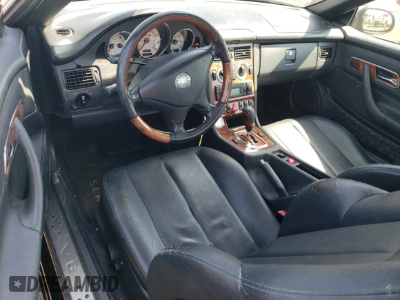2002 Mercedes-Benz SLK-Class 3.2L with VIN WDBKK65F12F254172, listed as a Copart auction lot 74336334 with 148,405 mi miles and Salvage Title. Bid and sale history available at carsss.com. Image 8.