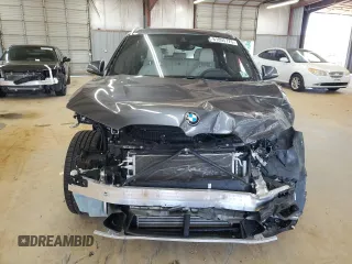 2021 BMW X1 xDrive28i with VIN WBXJG9C00M5S35249, listed as a Copart auction lot 61895775 with 34,641 mi miles and Salvage title. Bid and sale history available at DreamBid. Image 5.