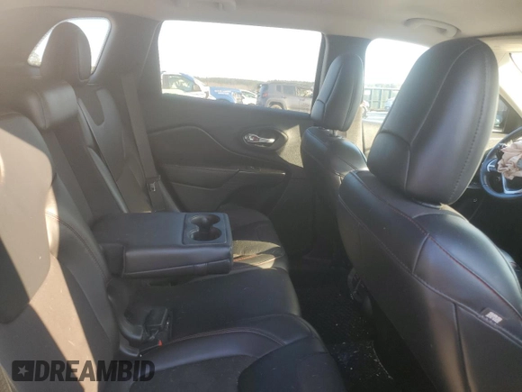 2015 Jeep Cherokee Trailhawk z VIN 1C4PJMBSXFW642149, wystawiony jako Copart lot #46656565 z przebiegiem 100 496 mil mil oraz Szkoda całkowita • Salvage title. Historia ofert i sprzedaży dostępna na DreamBid. Obrazek 10.