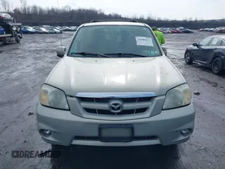 2006 Mazda Tribute S with VIN 4F2YZ04136KM15337, listed as a IAAI auction lot 41689177 with 153,720 mi miles and . Bid and sale history available at DreamBid. Image 6.