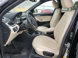 2018 BMW X1 xDrive28i with VIN WBXHT3C33J5L24195, listed as a Copart auction lot 38830283 with 35,004 mi miles. Bid and sale history available at carsss.com. Image 7.