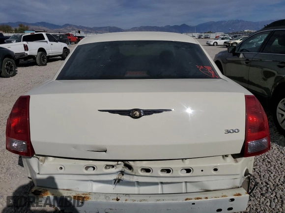 2005 Chrysler 300 with VIN 2C3JA43R25H616700, listed as a Copart auction lot 72081044 with 143,129 mi miles and Salvage Title. Bid and sale history available at carsss.com. Image 6.
