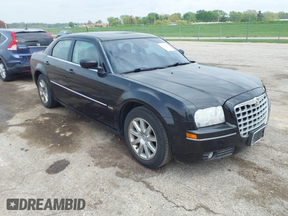2008 Chrysler 300 Touring with VIN 2C3LA53G08H147012, listed as a IAAI auction lot 42109759 with 169,244 mi miles. Bid and sale history available at carsss.com. Image 1.