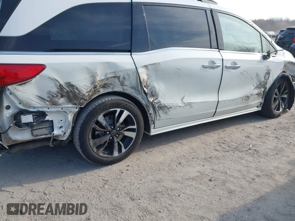 2019 Honda Odyssey Elite with VIN 5FNRL6H90KB019835, listed as a IAAI auction lot 42054752 with 110,659 mi miles and . Bid and sale history available at DreamBid. Image 6.