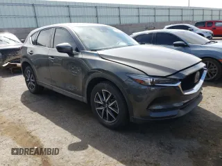 2018 Mazda CX-5 Grand Touring z VIN JM3KFBDM4J0300519, wystawiony jako Copart lot #51548745 z przebiegiem 102 853 mil mil oraz Szkoda całkowita • Salvage title. Historia ofert i sprzedaży dostępna na DreamBid. Obrazek 4.