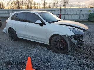 2014 Porsche Cayenne GTS z VIN WP1AD2A21ELA78053, wystawiony jako Copart lot #87922985 z przebiegiem 80 046 mil mil oraz Szkoda całkowita • Salvage title. Historia ofert i sprzedaży dostępna na DreamBid. Obrazek 4.