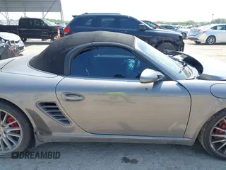 2007 Porsche Boxster S z VIN WP0CB29887U731046, wystawiony jako IAAI lot #42191204 z przebiegiem 153 037 mil mil oraz . Historia ofert i sprzedaży dostępna na DreamBid. Obrazek 13.