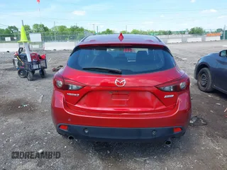 2014 Mazda 3 S Touring with VIN JM1BM1L36E1139818, listed as a IAAI auction lot 42129839 with 134,397 mi miles and . Bid and sale history available at DreamBid. Image 16.