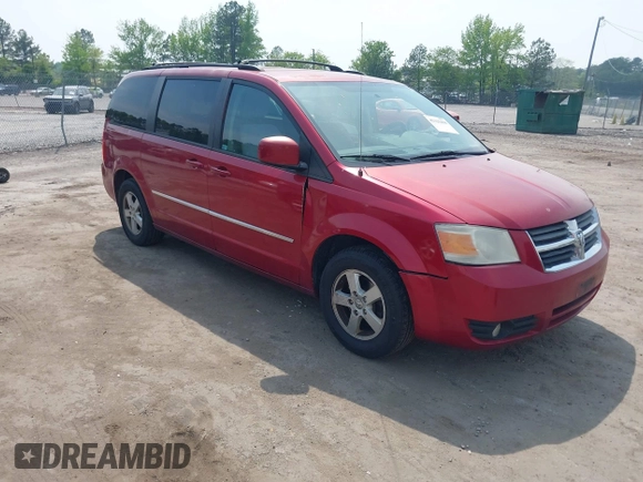 2010 Dodge Grand Caravan SXT with VIN 2D4RN5D17AR145958, listed as a IAAI auction lot 42125450 with 229,790 mi miles and . Bid and sale history available at DreamBid. Image 1.