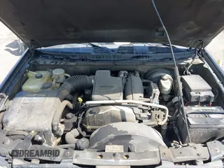 2006 GMC Envoy SLT with VIN 1GKDS13SX62247347, listed as a IAAI auction lot 42031142 with 263,599 mi miles. Bid and sale history available at carsss.com. Image 10.