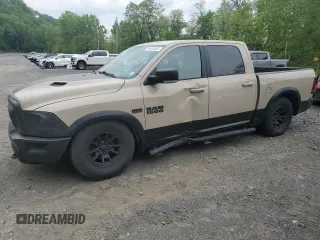 2017 Ram 1500 Rebel z VIN 1C6RR7YT0HS611836, wystawiony jako Copart lot #56943955 z przebiegiem 55 548 mil mil oraz Szkoda całkowita • Salvage title. Historia ofert i sprzedaży dostępna na DreamBid. Obrazek 1.