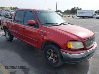 2002 Ford F-150 XLT with VIN 1FTRW07612KD89349, listed as a IAAI auction lot 41314354 with 1 mi miles. Bid and sale history available at carsss.com. Image 1.