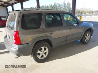 2006 Mazda Tribute i with VIN 4F2YZ02Z26KM12180, listed as a IAAI auction lot 41959606 with 228,217 mi miles and . Bid and sale history available at DreamBid. Image 4.