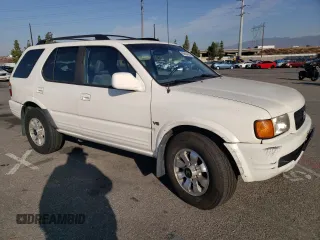 1998 Honda Passport LX с VIN 4S6CM58W4W4405306, выставлен на аукционе Copart как лот 65654254 с пробегом 141 198 миль миль и Списание • Salvage title. История ставок и продаж доступна на DreamBid. Изображение 4.
