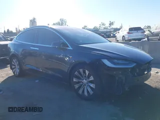2020 Tesla Model X Long Range with VIN 5YJXCBE20LF239761, listed as a IAAI auction lot 41289966 with 66,262 mi miles. Bid and sale history available at carsss.com. Image 1.