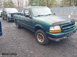 1999 Ford Ranger XL with VIN 1FTYR14V7XTA65621, listed as a IAAI auction lot 41824018 with 159,931 mi miles. Bid and sale history available at carsss.com. Image 1.