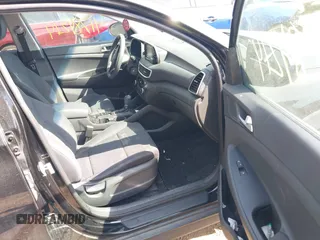 2019 Hyundai Tucson SE with VIN KM8J2CA4XKU852946, listed as a IAAI auction lot 41784214 with 120,857 mi miles. Bid and sale history available at carsss.com. Image 5.