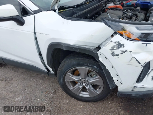 2022 Toyota RAV4 Hybrid XLE z VIN 4T3RWRFV4NU080211, wystawiony jako IAAI lot #42399810 z przebiegiem 101 205 mil mil oraz . Historia ofert i sprzedaży dostępna na DreamBid. Obrazek 6.